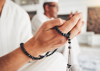 Image showing Prayer beads, Muslim person hands and Islamic faith, worship and trust in God with peace and religion. Devotion, spiritual and Islam with gratitude, respect and closeup with praying in the Mosque