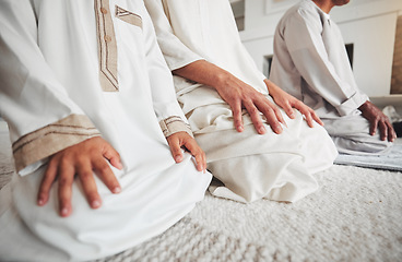 Image showing Prayer, muslim and islamic with hands of family on living room floor for eid mubarak, God and worship. Quran, hope and Ramadan with spiritual people praying at home for faith, religion and gratitude