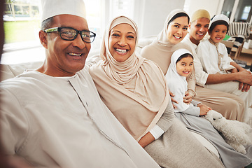 Image showing Selfie, Islam and big family on couch for Eid, parents and grandparents with kids in happy home in Dubai. Portrait of Muslim men, women in hijab and children, generations on sofa together in lounge.