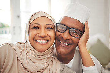 Image showing Portrait, Islam and senior couple in living room for Eid with smile, culture and love in home in Morocco. Face of elderly Muslim man, happy woman in hijab and happiness in marriage on sofa together.