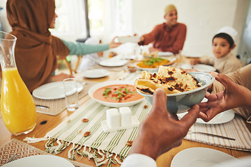 Image showing Food, roti and muslim with hands of family at table for eid mubarak, Islamic celebration and lunch. Ramadan festival, culture and iftar with closeup of people at home for fasting, islam or religion