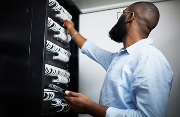 Image showing Server room, tablet and technician man with cable for internet connection for software programming. Engineer black person with tech for cybersecurity, hardware wire or maintenance in data center