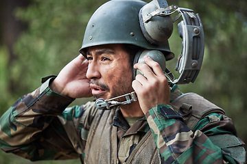 Image showing Radio, communication and military soldier talking with leadership in war or officer in army training with technology in emergency. Contact, control room and discussion of conflict or battlefield