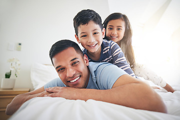 Image showing Family, portrait and play with fun and smile in a home with bonding and parent care. Happy, house and bedroom with a father and young children together in the morning with dad and kids with youth