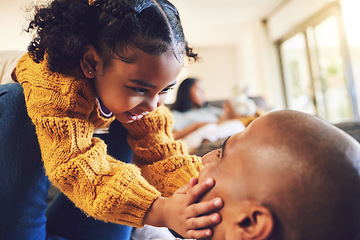 Image showing Happy father, girl and touch face in home living room, bonding and having fun together. Smile, dad and child play with cheeks, family and kid with care, love and enjoy quality time to relax in house.