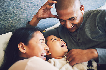 Image showing Home, family and parents relax, funny and happiness with quality time, bonding and loving together. Mother, father and female child laughing, humor and calm on a weekend break, care and kid with joy