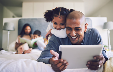 Image showing Happy, cartoon and father and a child with a tablet in the bedroom for games, app or streaming a video. Smile, family and a dad and a little girl watching a film on tech for education on a house bed