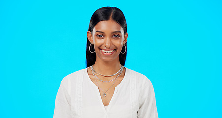 Image showing Laughing, studio and Indian woman face with blue background ready for work. Business employee, smile and happy portrait of a young female worker and professional isolated with happiness and joy