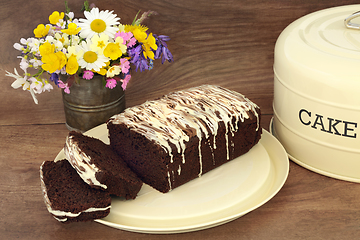 Image showing Chocolate Chip Cake with Spring Floral Wildflower Arrangement