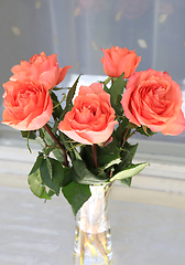 Image showing Beautiful bouquet of roses in a glass vase 