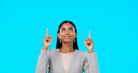 Image showing Face, employee and Indian woman with motivation, direction and happiness against a blue studio background. Portrait, female entrepreneur or lady with decision, inspiration or choice with joy or smile