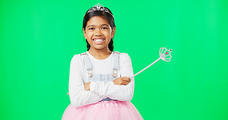 Image showing Girl child, princess and face in green screen studio with smile, happiness and playing game for fantasy. Happy young female, royal aesthetic and fairytale portrait for costume party, games or fantasy