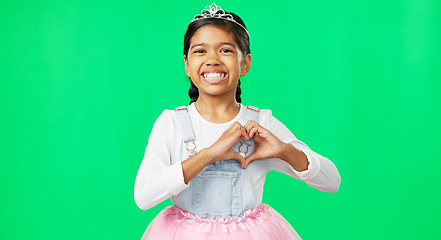 Image showing Heart, green screen and love hand gesture by child excited, smile and excited isolated in studio background. Young, care and support sign by girl or kid in princess costume or tutu showing symbol