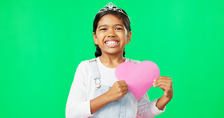 Image showing Portrait, heart and emoji with a girl on a green screen background for the celebration of valentines day. Kids, happy and love with a cute little female child holding a cardboard shape on chromakey