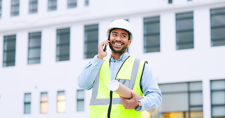 Image showing Excited, confident and happy architect talking on phone, agreeing to building plan for office development in city. Cheerful, ambitious contractor or surveryor negotiating blueprint deal on technology