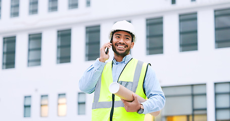 Image showing Excited, confident and happy architect talking on phone, agreeing to building plan for office development in city. Cheerful, ambitious contractor or surveryor negotiating blueprint deal on technology