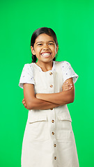 Image showing Happy, face and child in studio with green screen standing with crossed arms for confidence. Happiness, smile and portrait of girl kid model with cute and adorable expression by chroma key background