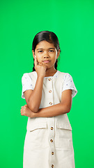 Image showing Girl, child and thinking of idea on green screen background with mockup space for plan or choice. Indian kid portrait in vertical studio with hand on chin planning, think or brainstoming decision