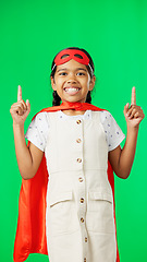 Image showing Superhero, point and face of child on green screen for fantasy, cosplay costume and comic character. Advertising, copy space and portrait of kid in studio for freedom, fight crime and games mockup