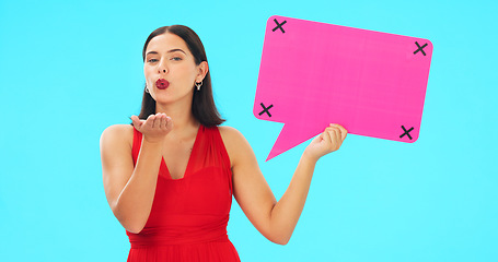 Image showing Speech bubble, face and woman blowing kiss in studio for romance, flirting and poster on blue background. Banner, portrait and girl flirt with mockup for social media, advertising or online dating