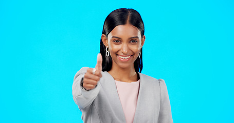 Image showing Thumbs up, perfect and happy businesswoman doing accept hand gesture, sign or symbol with smile. Excited, agreement and portrait of female showing approval isolated in blue studio background