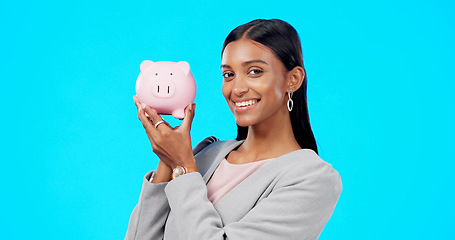 Image showing Portrait, piggy bank or happy Indian woman with savings budget or financial profits growth on studio background. Smile, finance or excited girl holding financial tin for cash loan or money investment