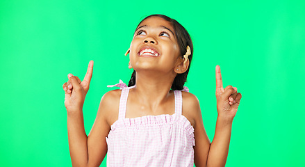 Image showing Face, pointing and black girl with motivation, green screen and inspiration with joy, happiness and space. Portrait, African American female child or young person with gesture for direction or choice