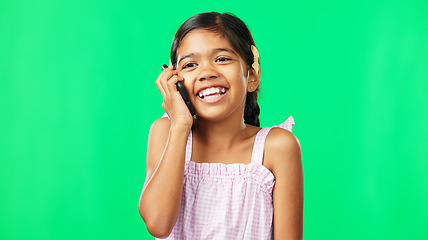 Image showing Communication, green screen and girl with smile, phone call and connection against studio background. Female child, young person and happy kid with smartphone for conversation, signal and discussion