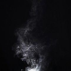 Image showing Grey smoke, white background and studio with no people with fog in the air. Smoking, smog swirl and isolated with smoker art from cigarette or pollution with graphic space for incense creativity