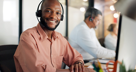 Image showing Call center, customer support and face of a black man consultant doing online consultation in the office. Customer service, sales employee and telemarketing agent working on crm strategy in workplace