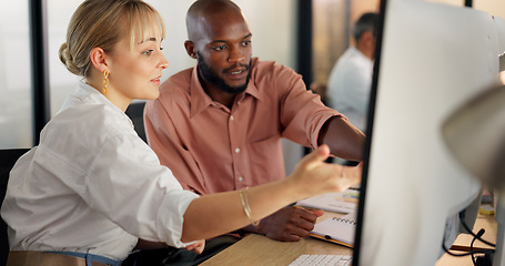 Image showing Teamwork, human resources and training with a business woman explaining to an intern working in an office. Marketing, computer and collaboration with a male and female employee team at work together