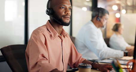 Image showing Call center, customer support and face of a black man consultant doing online consultation in the office. Customer service, sales employee and telemarketing agent working on crm strategy in workplace