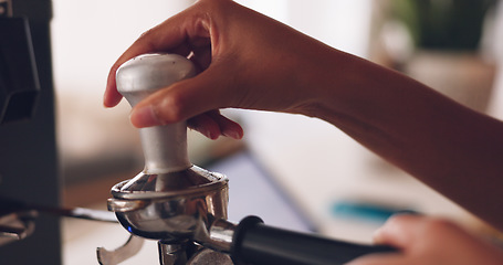 Image showing Hands, barista and coffee machine with an employee working behind a kitchen counter in a cafe for service. Waiter, cafeteria and caffeine with a person making a drink at work in a restaurant