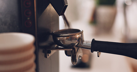 Image showing Coffee machine, barista hand and grind beans in cafe, closeup and prepare latte or espresso drink with service. Hot beverage, person working in restaurant and brewing process, premium blend caffeine