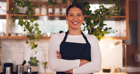 Image showing Face, woman and barista with arms crossed, smile and confidence in store, success and waitress in cafe. Portrait, female employee or lady with happiness, entrepreneur or business owner in coffee shop