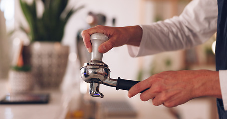 Image showing Hands, barista and coffee maker with an employee working behind a kitchen counter in a cafe for service. Waiter, cafeteria and caffeine with a person making a drink at work in a restaurant