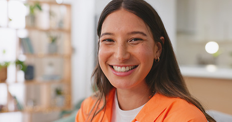 Image showing Face, happy and woman on couch, relax and positive in living room, carefree and resting. Portrait, American female and lady on sofa, smile and stress relief in lounge, girl with happiness or cheerful