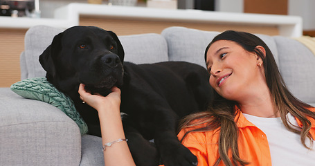 Image showing Relax, dog and woman on couch, playing and happiness on break, resting and quality time in living room. Female on sofa, happy lady and pet in lounge, carefree and domestic animal with owner love