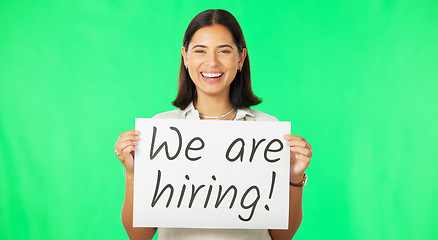 Image showing Woman with hiring sign, job advertising on green screen and smile, mockup with portrait. Billboard, poster and happy female with board with text, work opportunity and recruitment on studio background