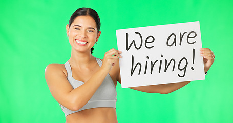 Image showing Happy woman, hiring poster and green screen with job advertising, work opportunity at gym in portrait. Billboard, sign and female with smile and recruitment at fitness club on studio background