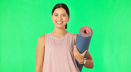 Image showing Woman, face and smile with yoga and green screen, mockup space and fitness with pilates and exercise mat. Portrait, happy female and workout with happiness, laughing and training on studio background
