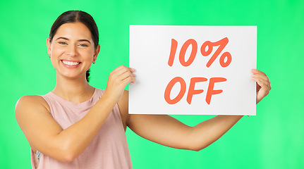 Image showing Portrait, woman and sale sign on green screen advertising percentage or discount rate on paper or banner. Smile of a happy female on a studio background for promotion deal, savings or deal and offer