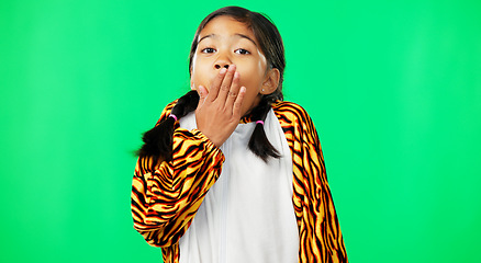 Image showing Face, green screen and girl in tiger costume, surprise and hand on mouth on a studio background. Portrait, female child and young person with shock, excitement and happiness with adorable kid and wow
