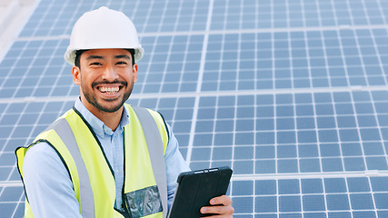 Image showing Solar, electricity and construction being done by an engineer while using a tablet for research or planning. Portrait of one young and cheerful architect smiling while browsing on technology