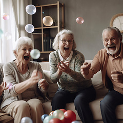 Image showing Happy, laughing and senior friends on a sofa playing games together in the living room of a home. Happiness, bonding and elderly people in retirement bonding and talking in the lounge of a house.