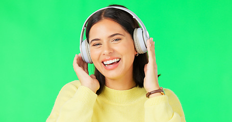 Image showing Face, green screen and woman with headphones, dance and music streaming against a studio background. Portrait, female and person with headset, listening to audio and sounds for movement and smile