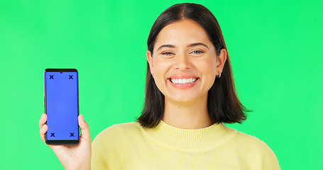 Image showing Happy woman, phone and mockup on green screen with tracking markers for advertising against studio background. Portrait of female with smartphone display for advertisement or marketing on copy space