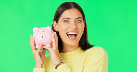 Image showing Happy woman, face and money savings on green screen for investment, budget or finance against studio background. Portrait of excited female holding piggybank for coin, profit or investing on mockup