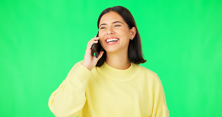 Image showing Happy woman, phone call and conversation on green screen for communication against a studio background. Female talking on mobile smartphone in funny discussion laughing for fun joke or meme on mockup