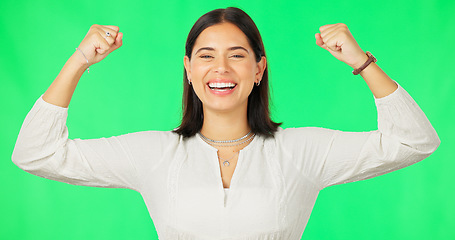 Image showing Strong, green screen and happy woman isolated on studio background for gender equality fight, power and strength. Empowerment, feminism and face of young person face winning and celebration fist pump
